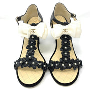 Chanel high heeled T-strap sandals leather camelia detail with pearls white  bow 