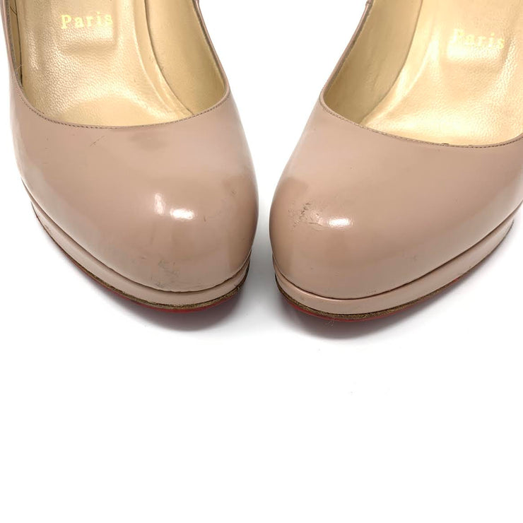Beige leather Christian Louboutin platform pumps with round toe