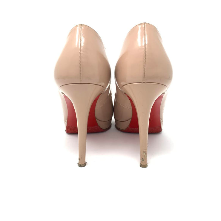 Beige leather Christian Louboutin platform pumps with round toe