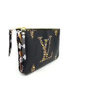 Louis Vuitton Monogram Giant Jungle Pochette Double Zip Consignment Shop From Runway With Love