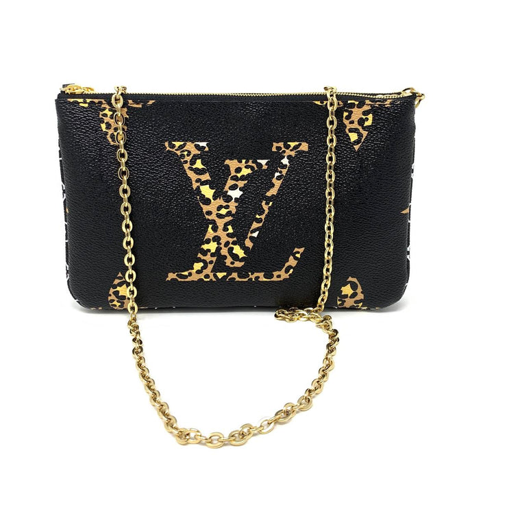 Louis Vuitton Monogram Giant Jungle Pochette Double Zip Consignment Shop From Runway With Love