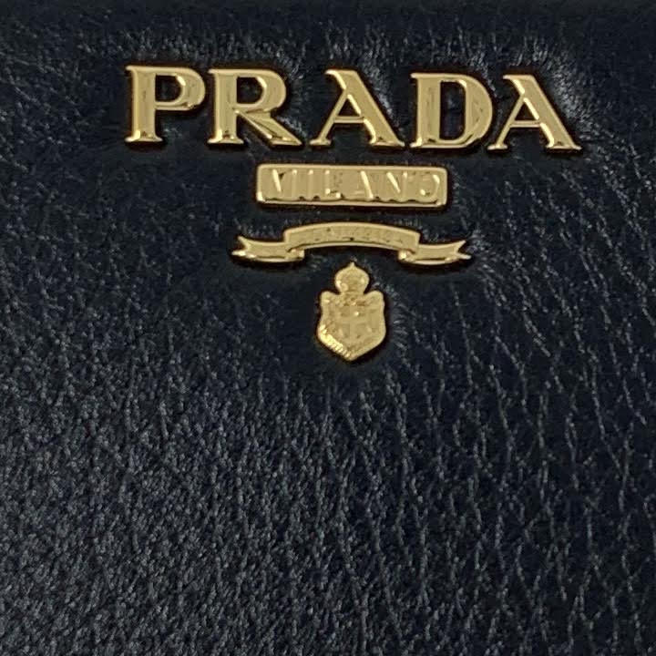 Prada Continental Wallet Black Leather Gold Consignment Shop From Runway With Love