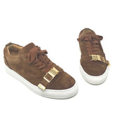 Buscemi buckled calf suede low-top Sneaker in tan. Consists of a 1 inch sole with a round toe and golden buckle. Lace up front with an embossed logo on the side and the tongue. Rubber outsole. Faint signs of wear on the soles and light fading on the suede.  Size: EU 43  Made in Italy. 
