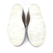 Buscemi buckled calf suede low-top Sneaker in tan. Consists of a 1 inch sole with a round toe and golden buckle. Lace up front with an embossed logo on the side and the tongue. Rubber outsole. Faint signs of wear on the soles and light fading on the suede.  Size: EU 43  Made in Italy. 